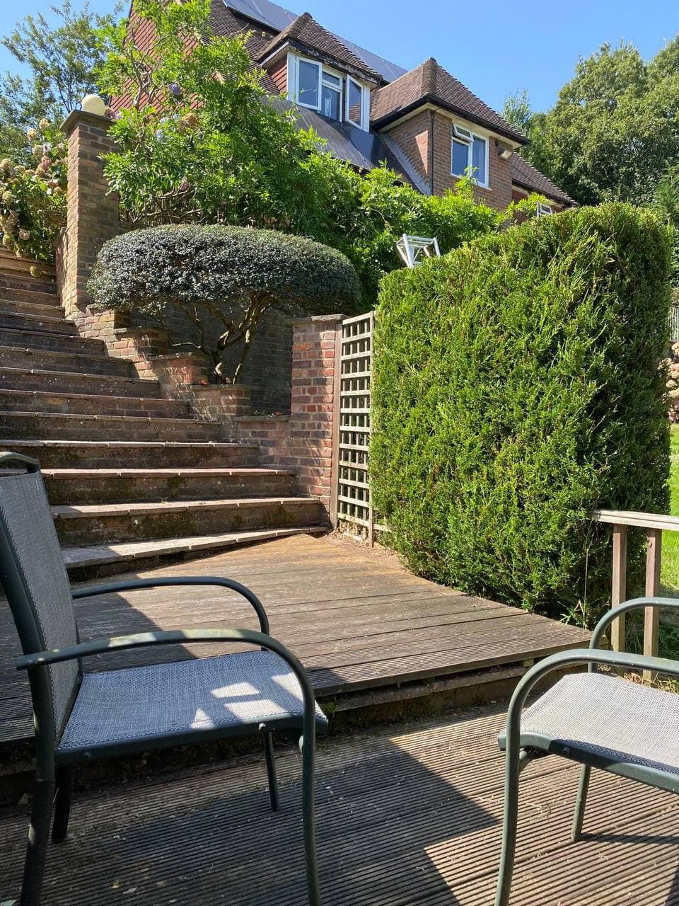 Terraced garden with decking and steps